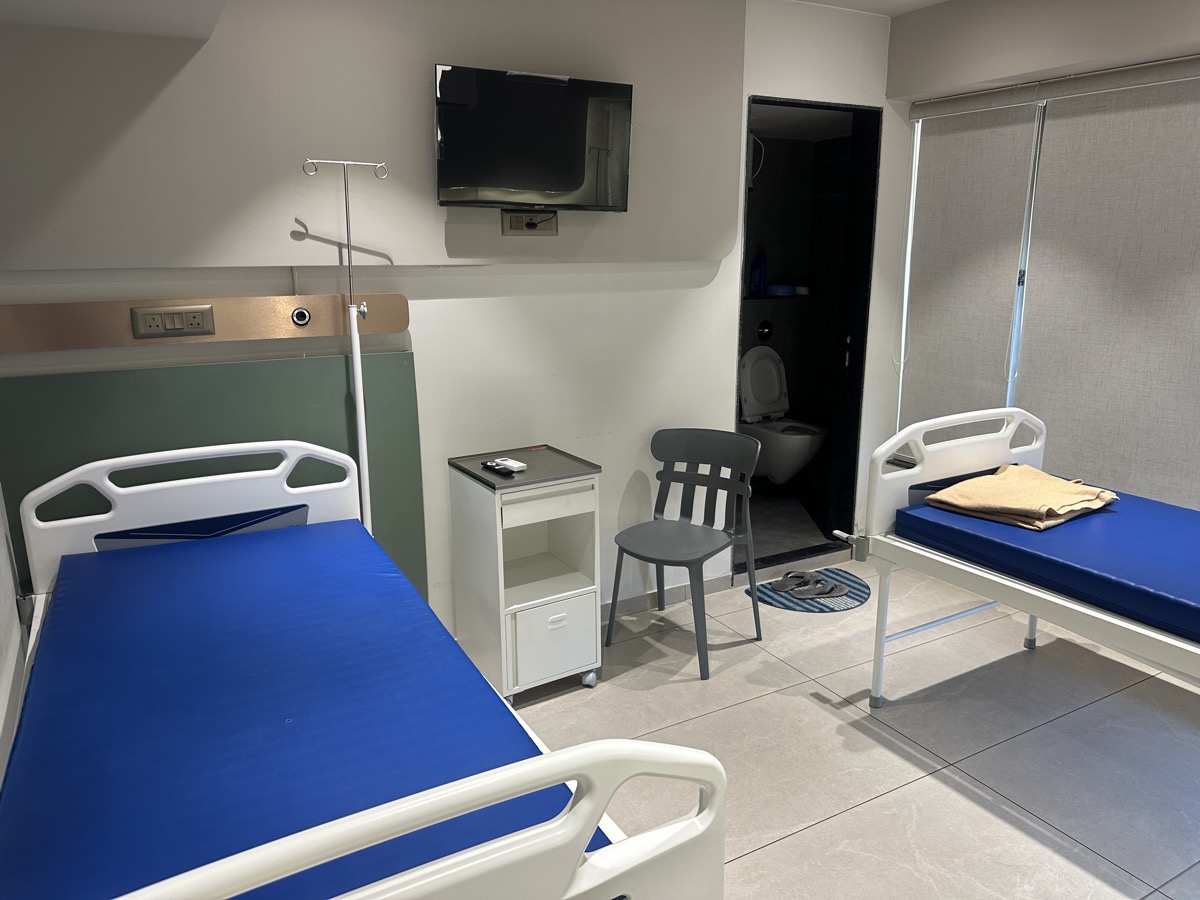 Twin Sharing Room at Procto Surgical Hospital